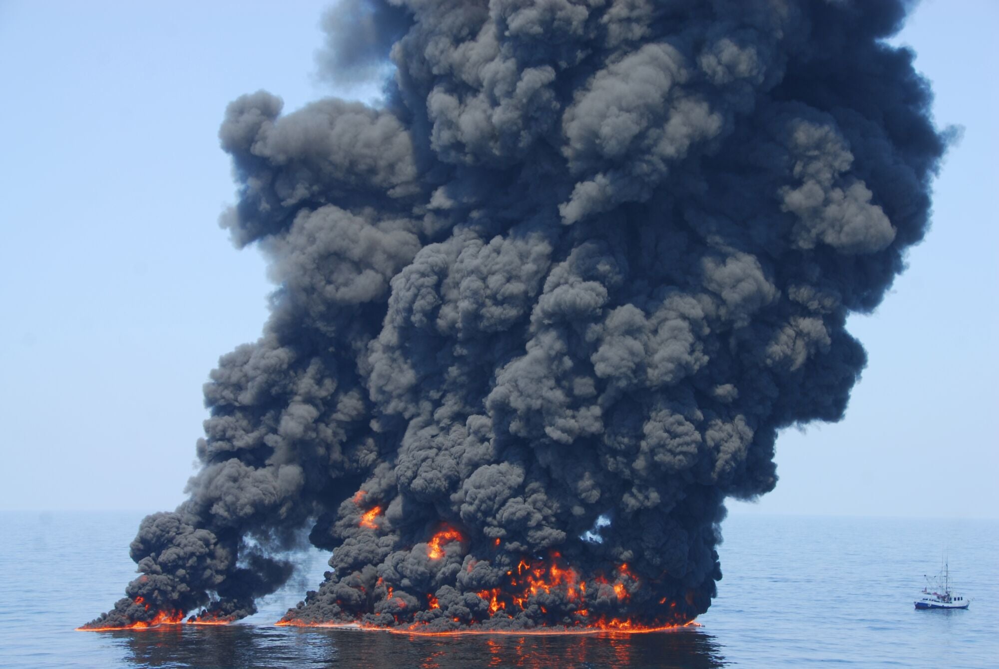 A controlled burn of oil from the Deepwater Horizon/BP oil spill sends towers of fire hundreds of feet into the air over the Gulf of Mexico on June 9, 2010.