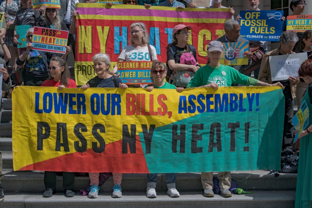 Over 100 New Yorkers joined environmental organizations on Earth Day at the steps of City Hall to rally for the NY HEAT Act, a major climate and affordability bill that would cut emissions and saving low and moderate income New Yorkers an average of $136 per month. (Erik McGregor / LightRocket via Getty Images)